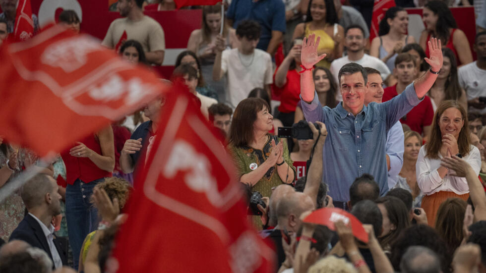 Spain's Prime Minister and Socialist Workers' Party candidate Pedro Sanchez cheers to his supporters during a campaign closing meeting in Madrid, Spain, Friday, July 21, 2023.