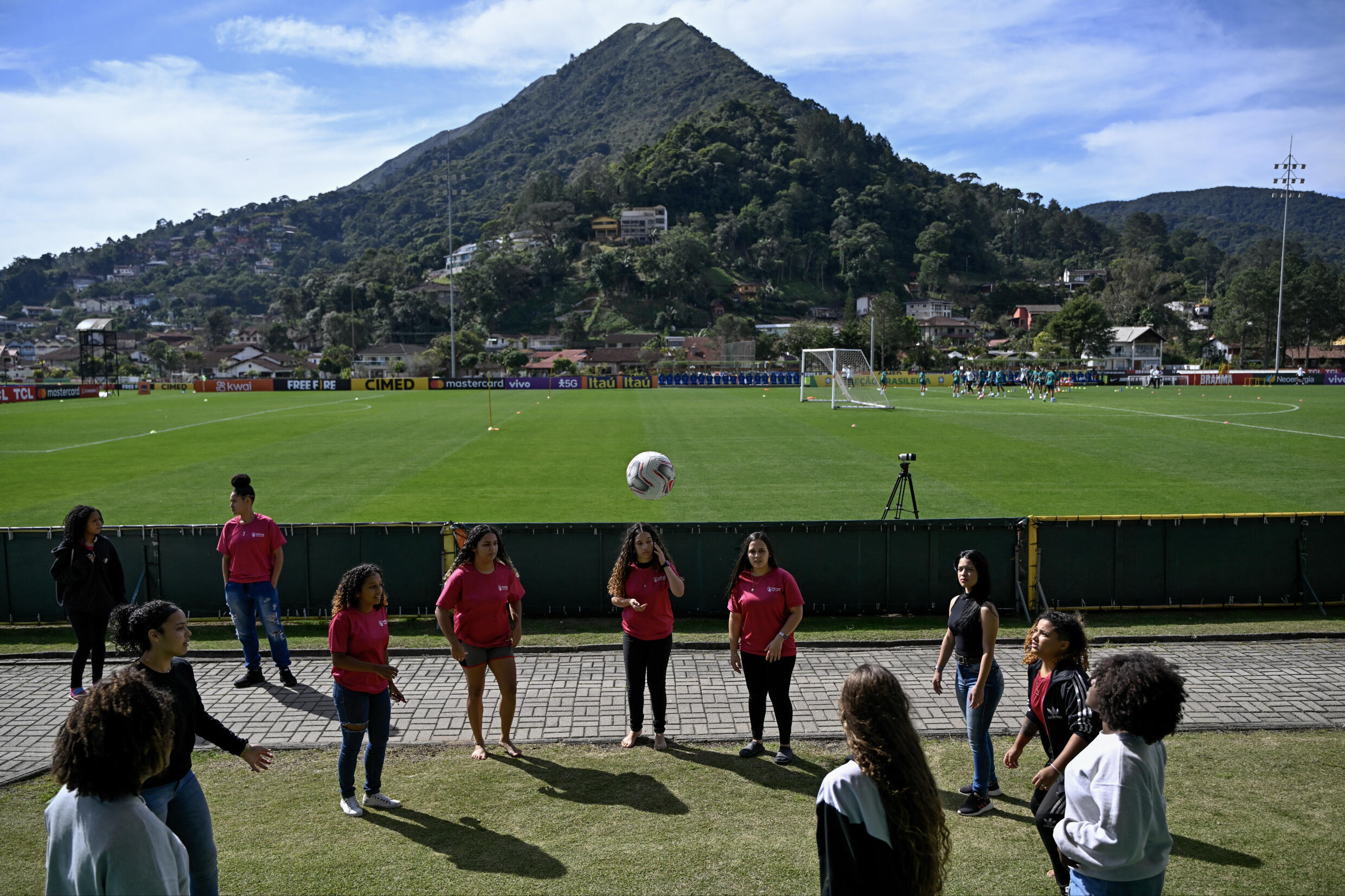 Girls play football as the Brazilian women's national team train at their Granja Comary base in Teresopolis, near Rio de Janeiro State