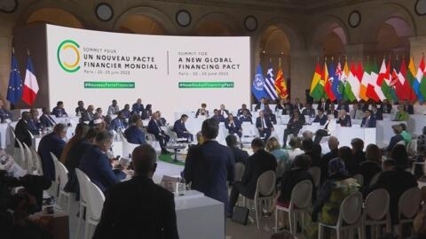 Paris finance summit breaks new ground in climate, poverty fight